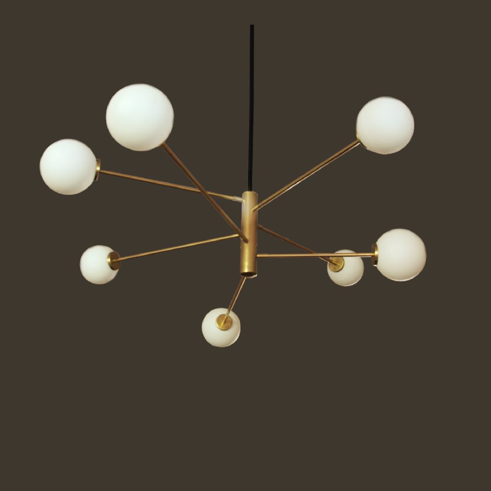 Brass and opaline chandelier: Graphic balance and warm lighting
