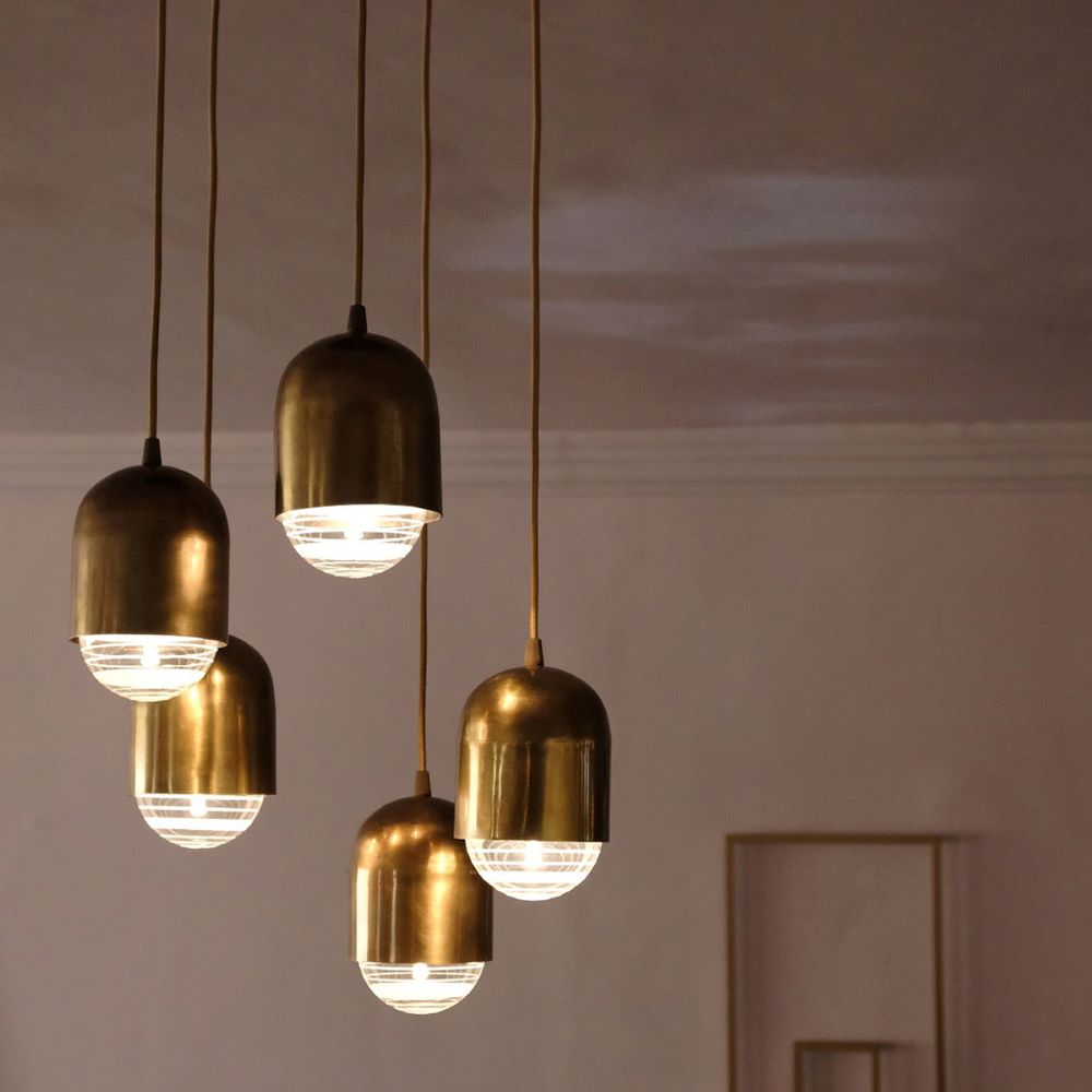 Brass designer pendant light: Contemporary clarity and soothing light