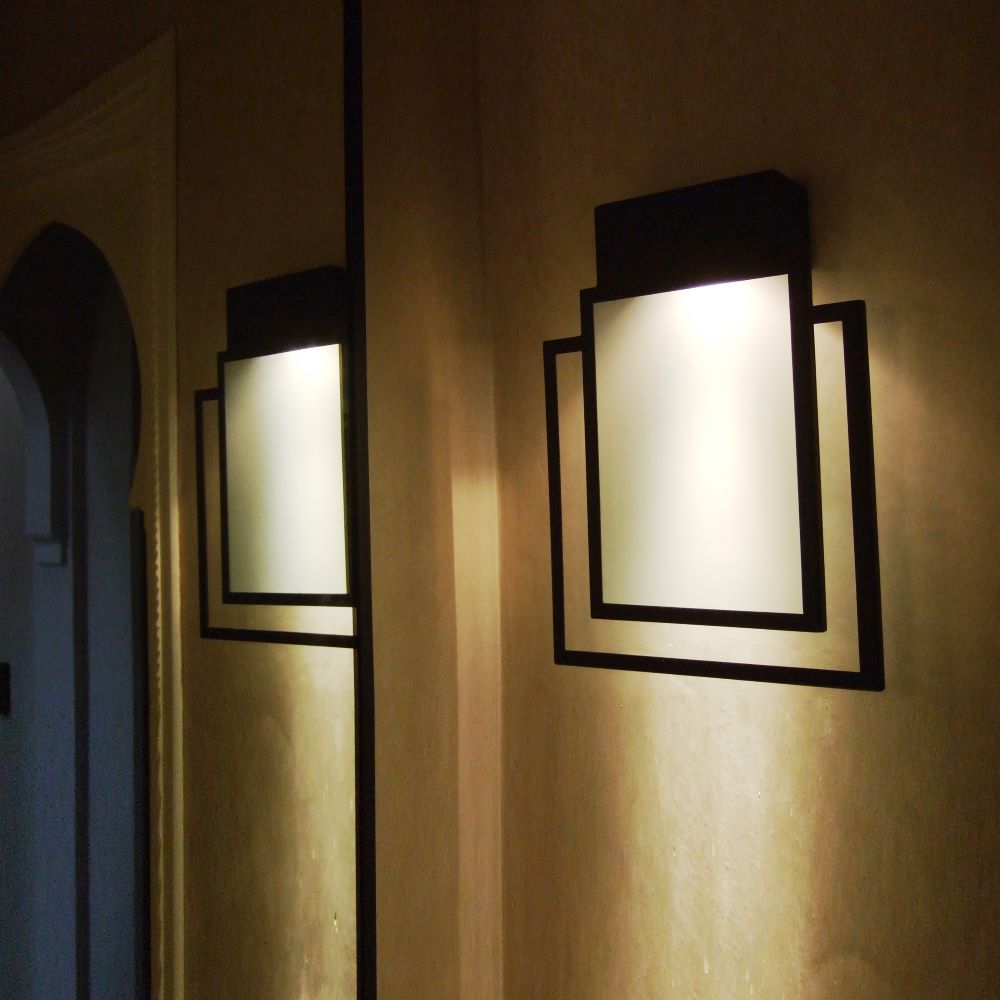Black steel wall light with dual frame and frosted glass panel. Indirect LED lighting, handcrafted. H 50 cm x W 35 cm.
