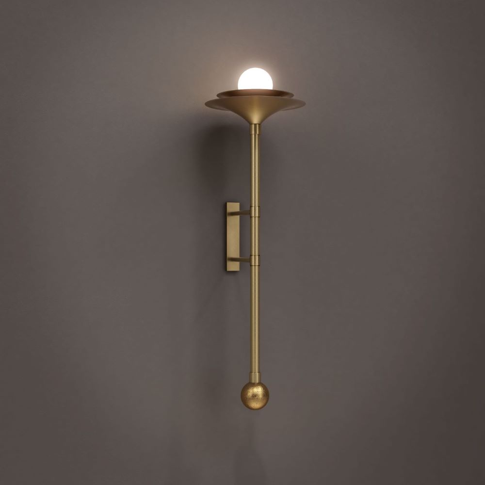 Modern brass wall sconce light with patinated finish and opal globe. Vertical silhouette, soft upward light, timeless and handcrafted design.