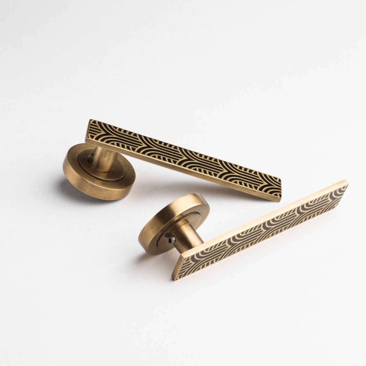 Engraved brass lever handle