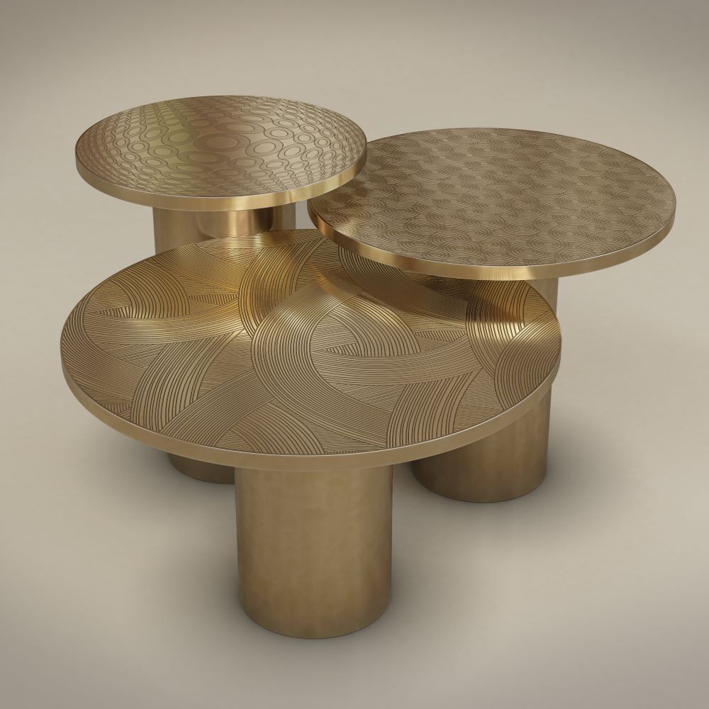 Brass side tables with engraved brass top.