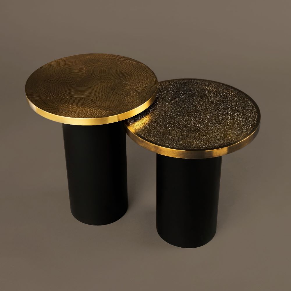 Side tables with stingray-effect hammered brass top, or engraved brass top, and black steel feet.